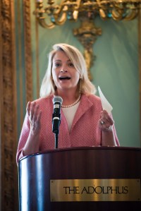 Me launching my debut novel over tea at The Adolphus Hotel